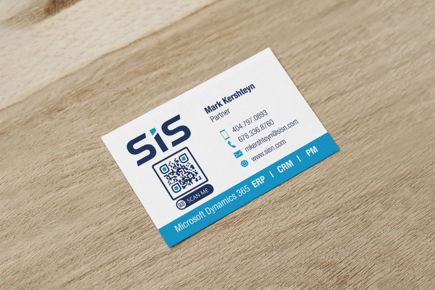 an image of a business card on a wooden background